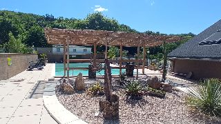 Camping La Romiguiere : Coin zen a la piscine